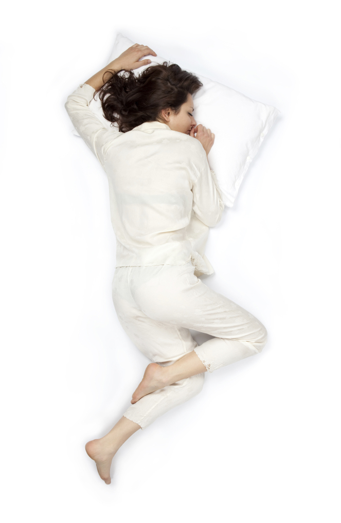composition of sleep pose beautiful young girl with pajamas isol
